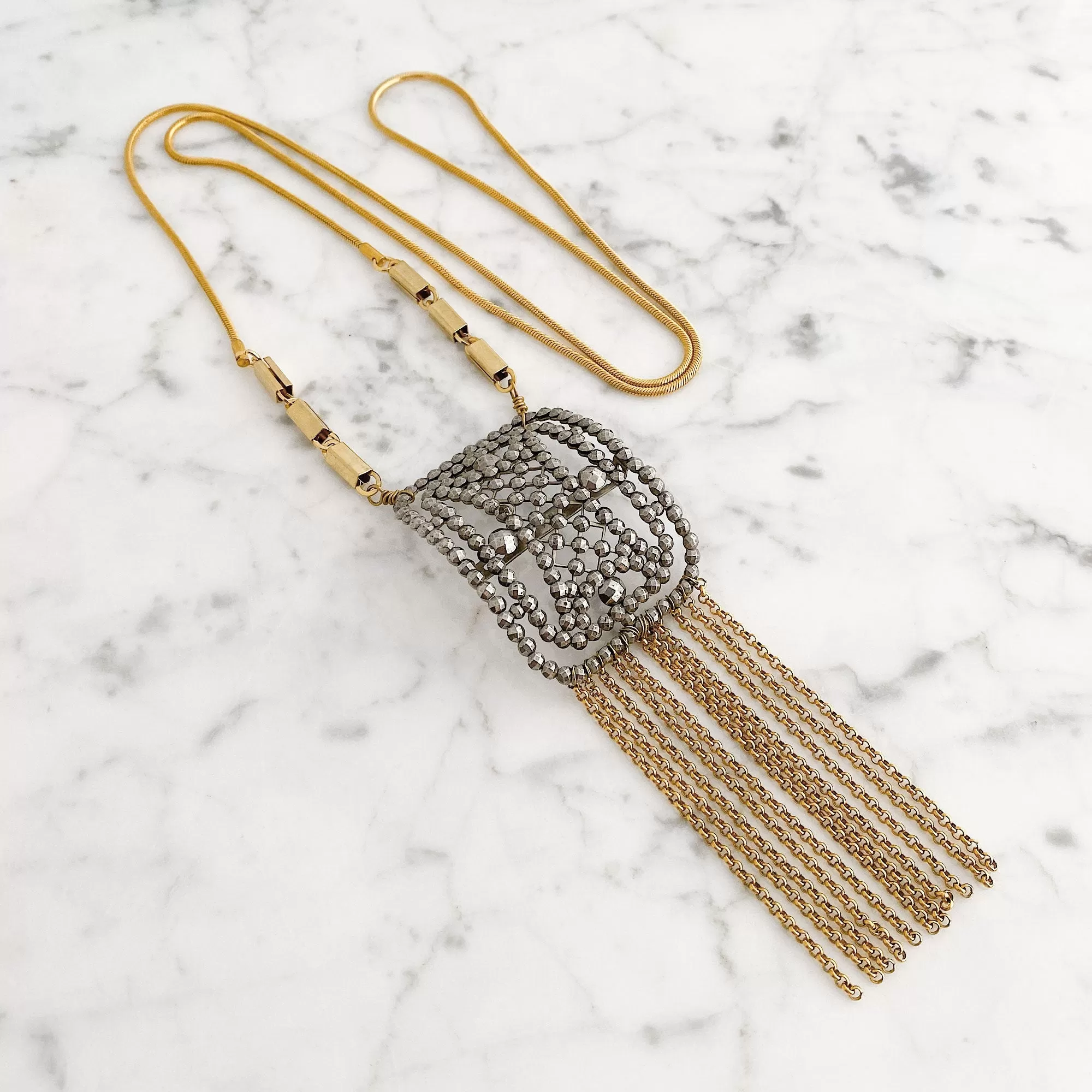 HENDRICK cut steel buckle necklace from Paris