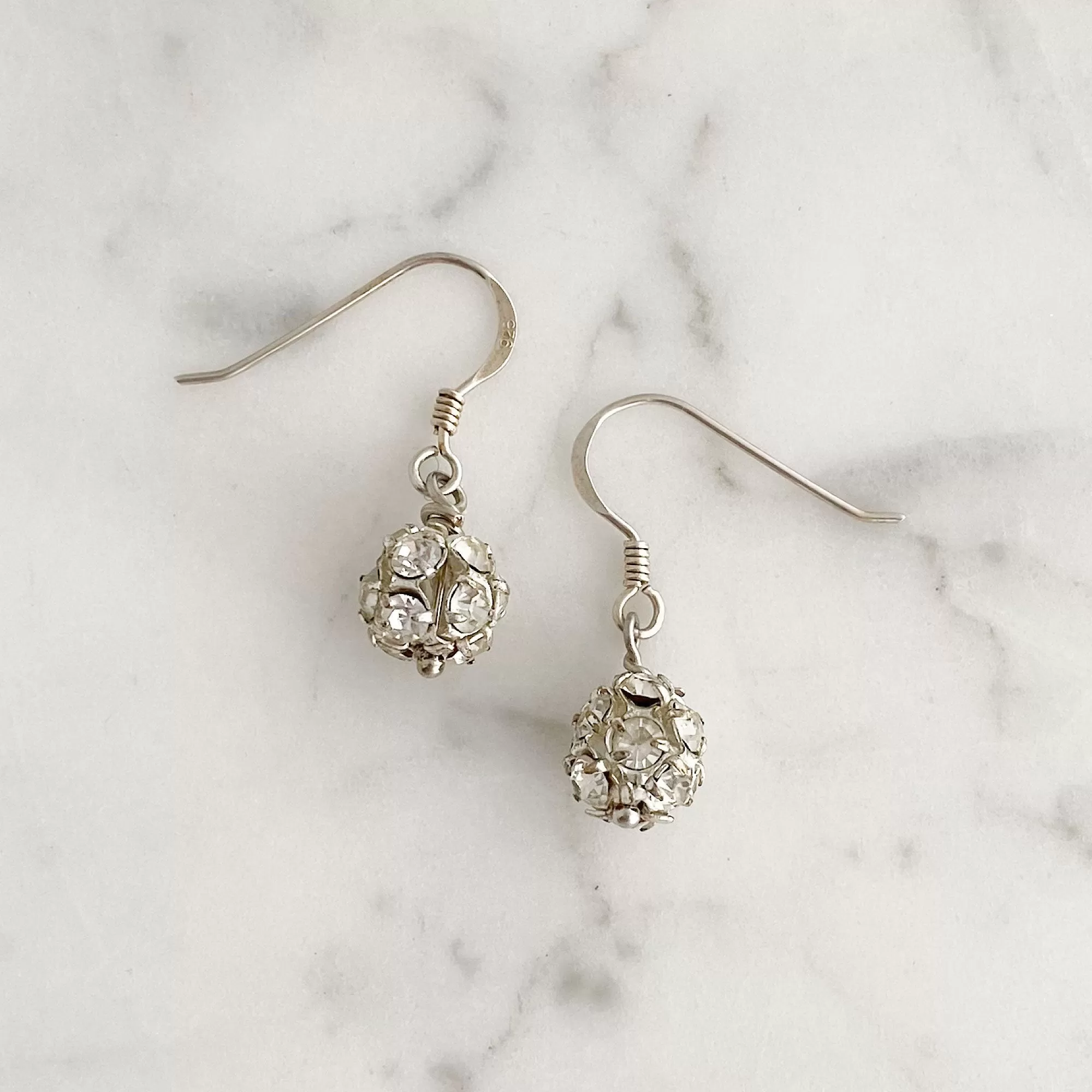 LOLA silver rhinestone ball earrings