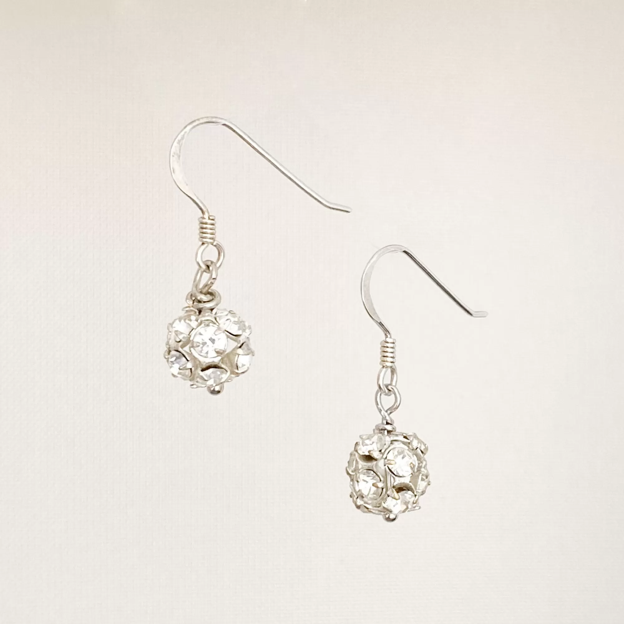 LOLA silver rhinestone ball earrings