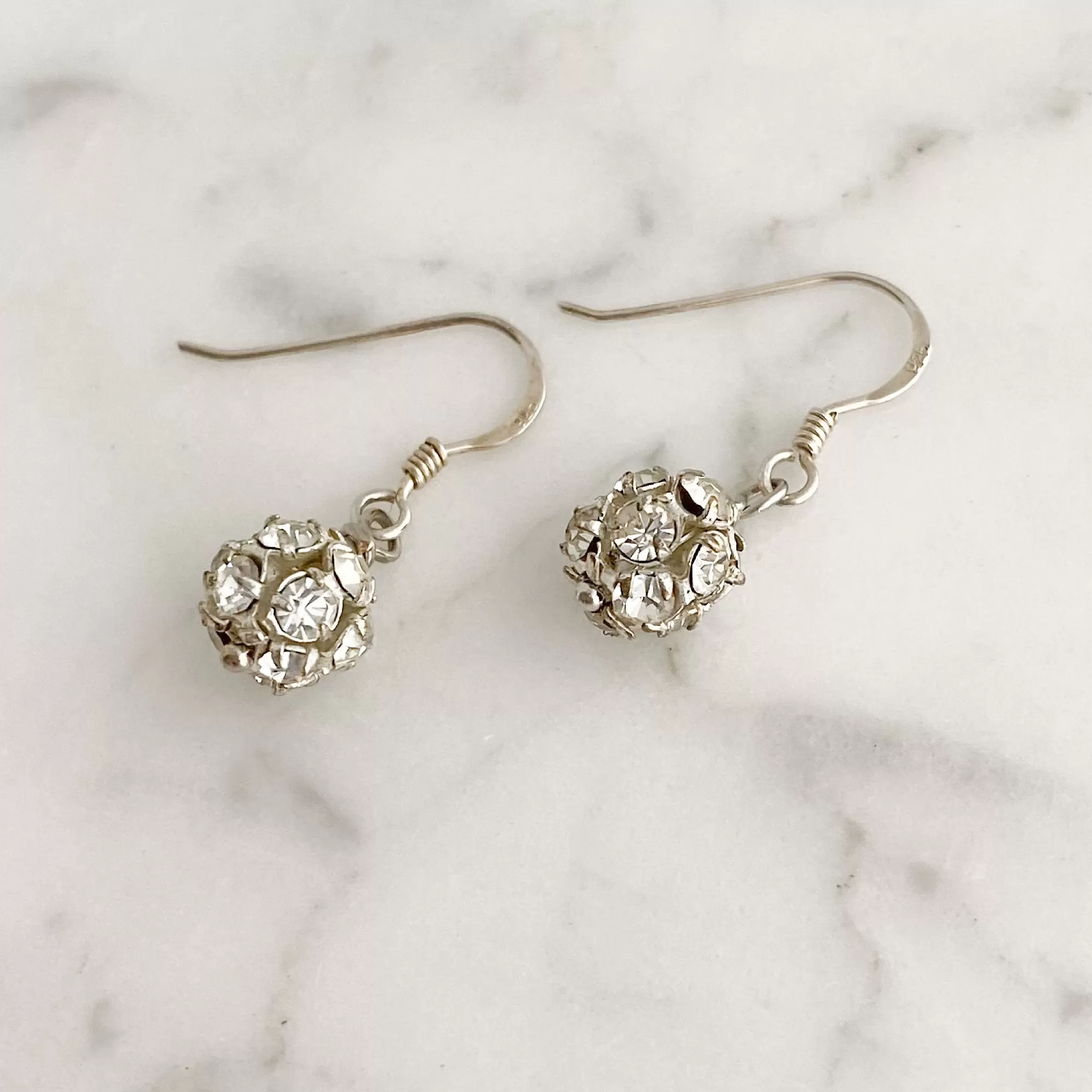 LOLA silver rhinestone ball earrings