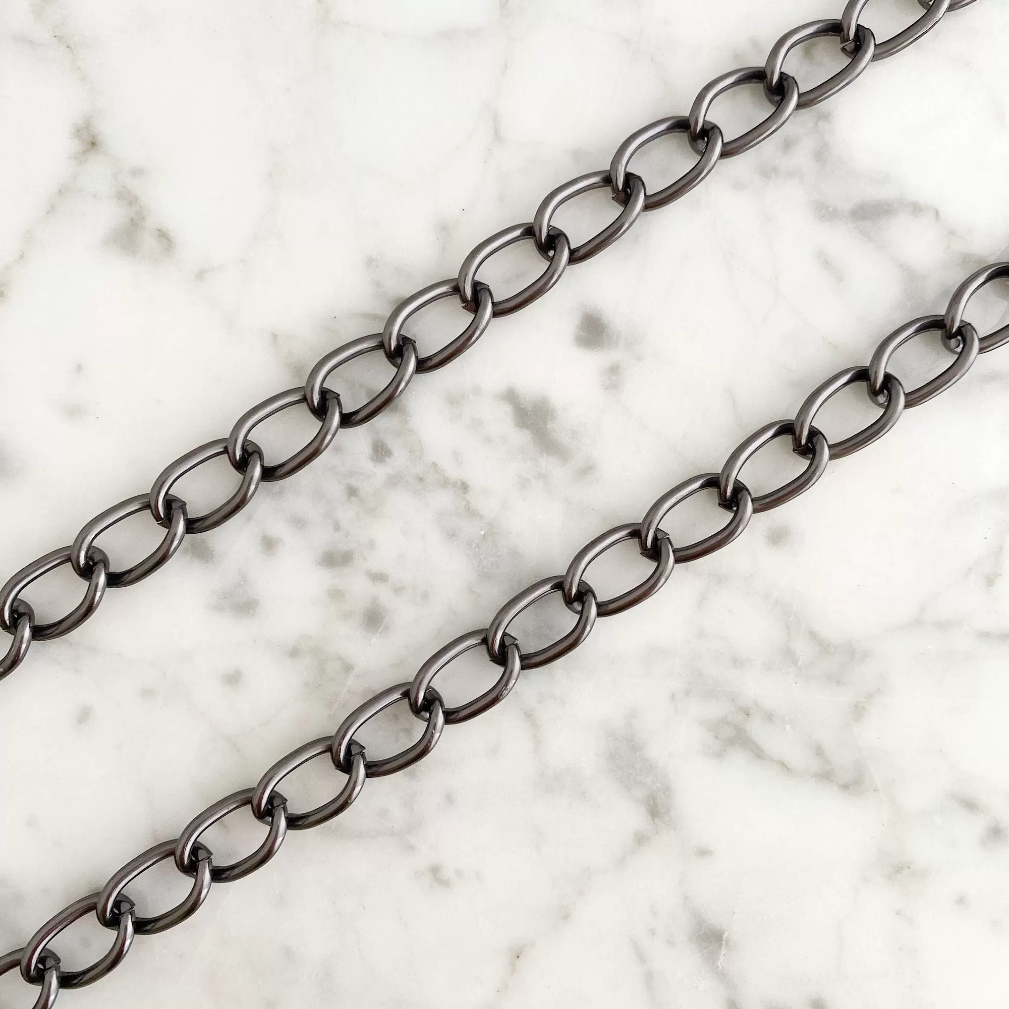 MARIBETH gun metal chain belt