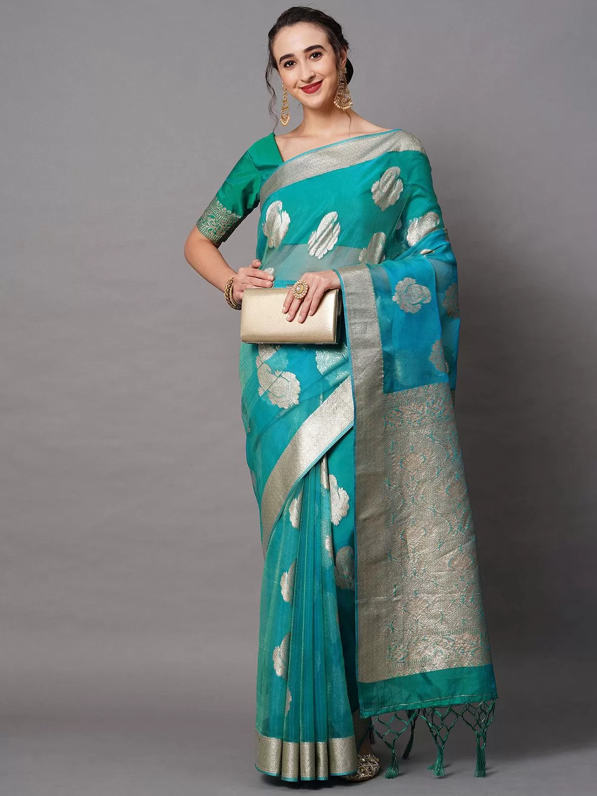 Odette Women Teal Blue Party Wear Organza Woven Design Saree With Unstitched Blouse